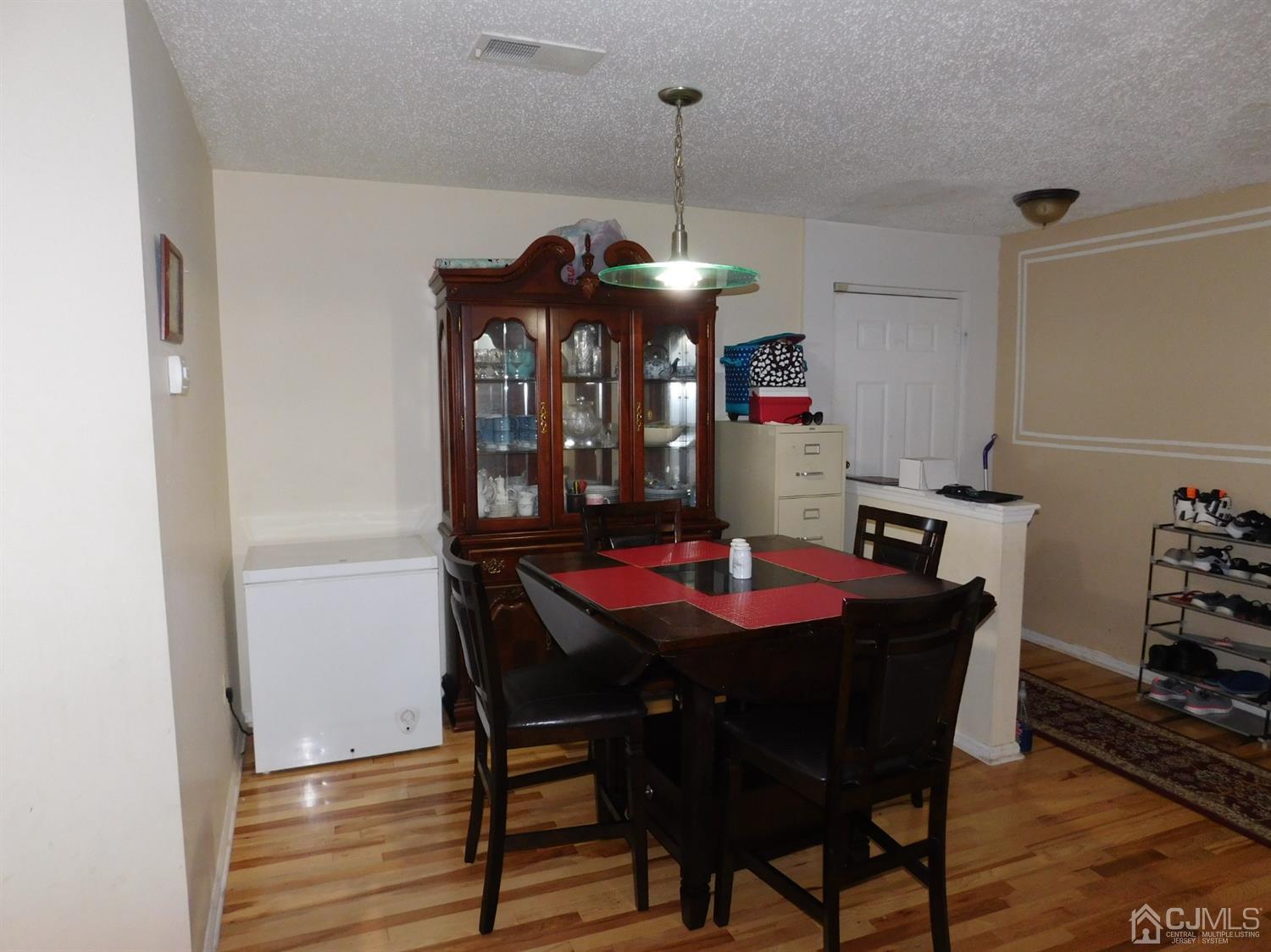 723 Edpas Road New Brunswick, NJ 08901 - Photo 10 of 20 a view of a dining room with furniture and window