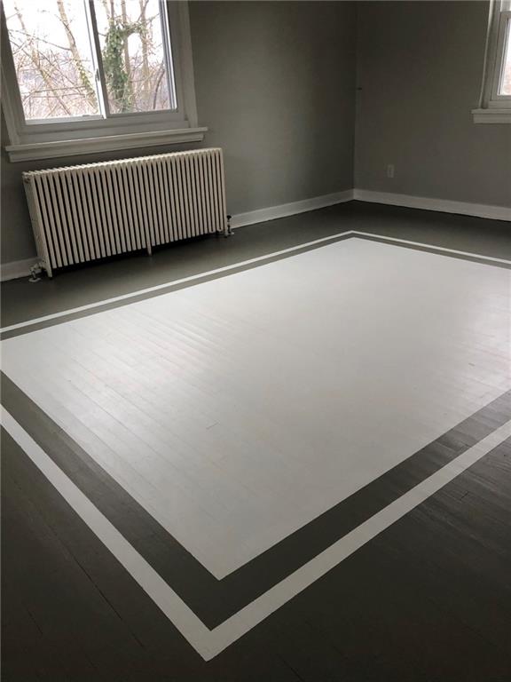 5450 Covode Place Pittsburgh, PA 15217 - Photo 19 of 25 an empty room with wooden floor