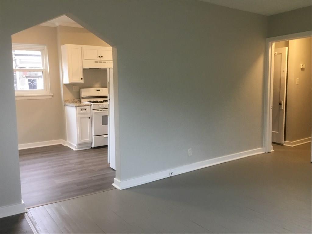 5450 Covode Place Pittsburgh, PA 15217 - Photo 4 of 25 an empty room with windows and closet