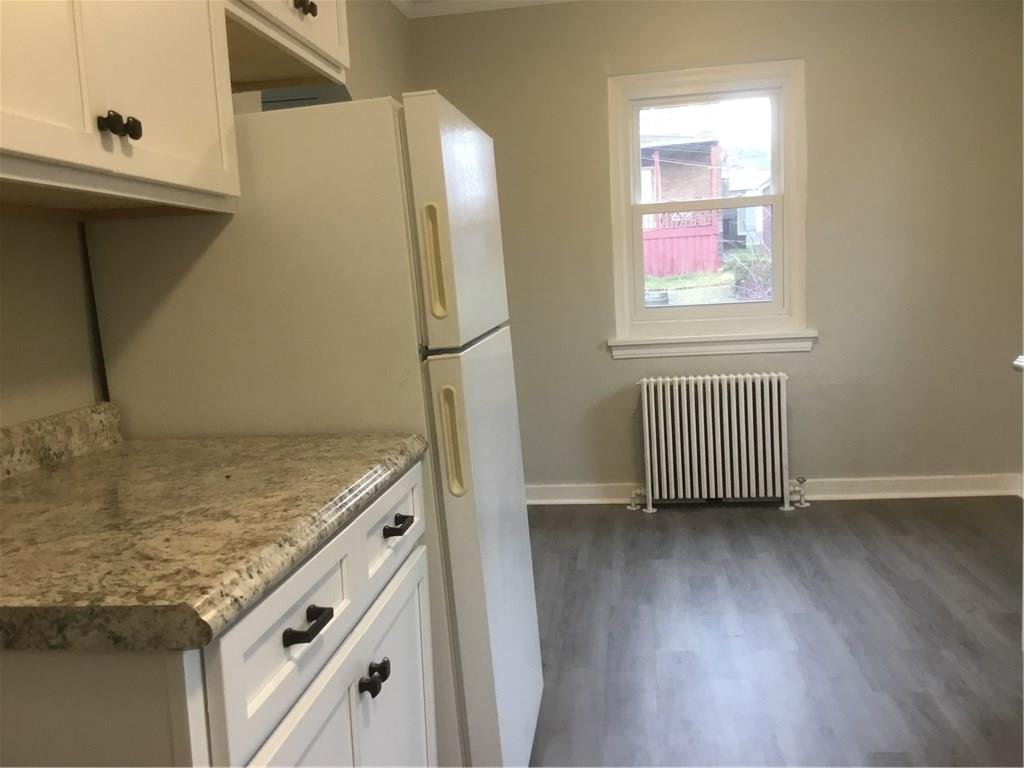 5450 Covode Place Pittsburgh, PA 15217 - Photo 10 of 25 a view of a kitchen from a hallway