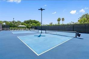 14531 Bretton Woods Trace Delray Beach, FL 33446 - Photo 20 of 57 a view of a tennis court