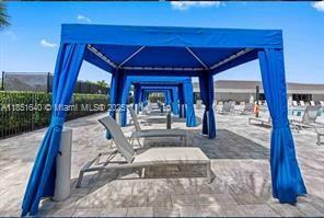 14531 Bretton Woods Trace Delray Beach, FL 33446 - Photo 34 of 57 a view of a porch with a patio