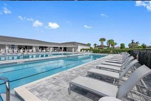 14531 Bretton Woods Trace Delray Beach, FL 33446 - Photo 39 of 57 a view of a house with swimming pool