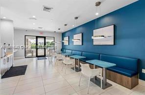 14531 Bretton Woods Trace Delray Beach, FL 33446 - Photo 51 of 57 a living room with furniture and a large window