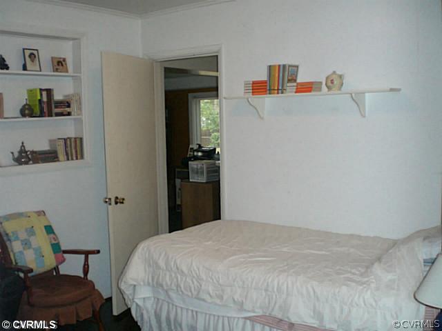 1206 Rosecroft Road Henrico, VA 23229 - Photo 11 of 12 Bedroom - hardwoods, built-in bookcase