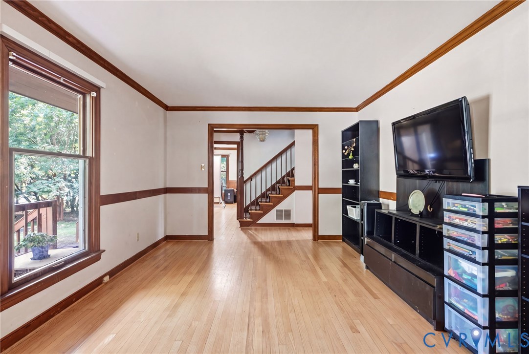 13611 Winterberry Ridge Midlothian, VA 23112 - Photo 6 of 30 Hardwood flooring, white walls, and wood trim