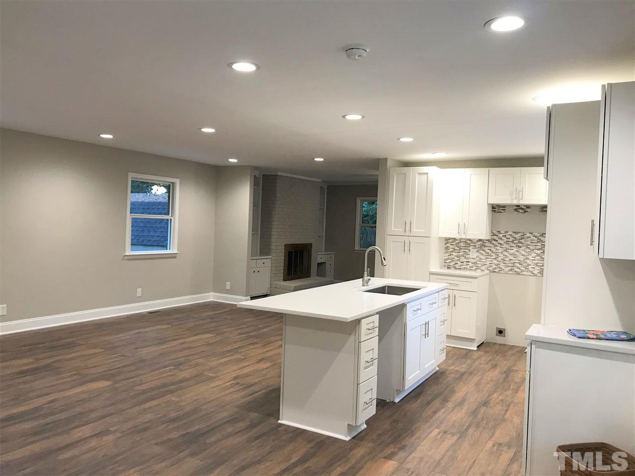 932 Bluestone Road Durham, NC 27713 - Photo 2 of 18 Great kitchen and living room open and bright space. Island, quartz counter tops, upgraded cabinets! Brand new Samsung appliances delivered this week (5/7/20). Refrigerator, Range/Oven, Dishwasher, Microwave!