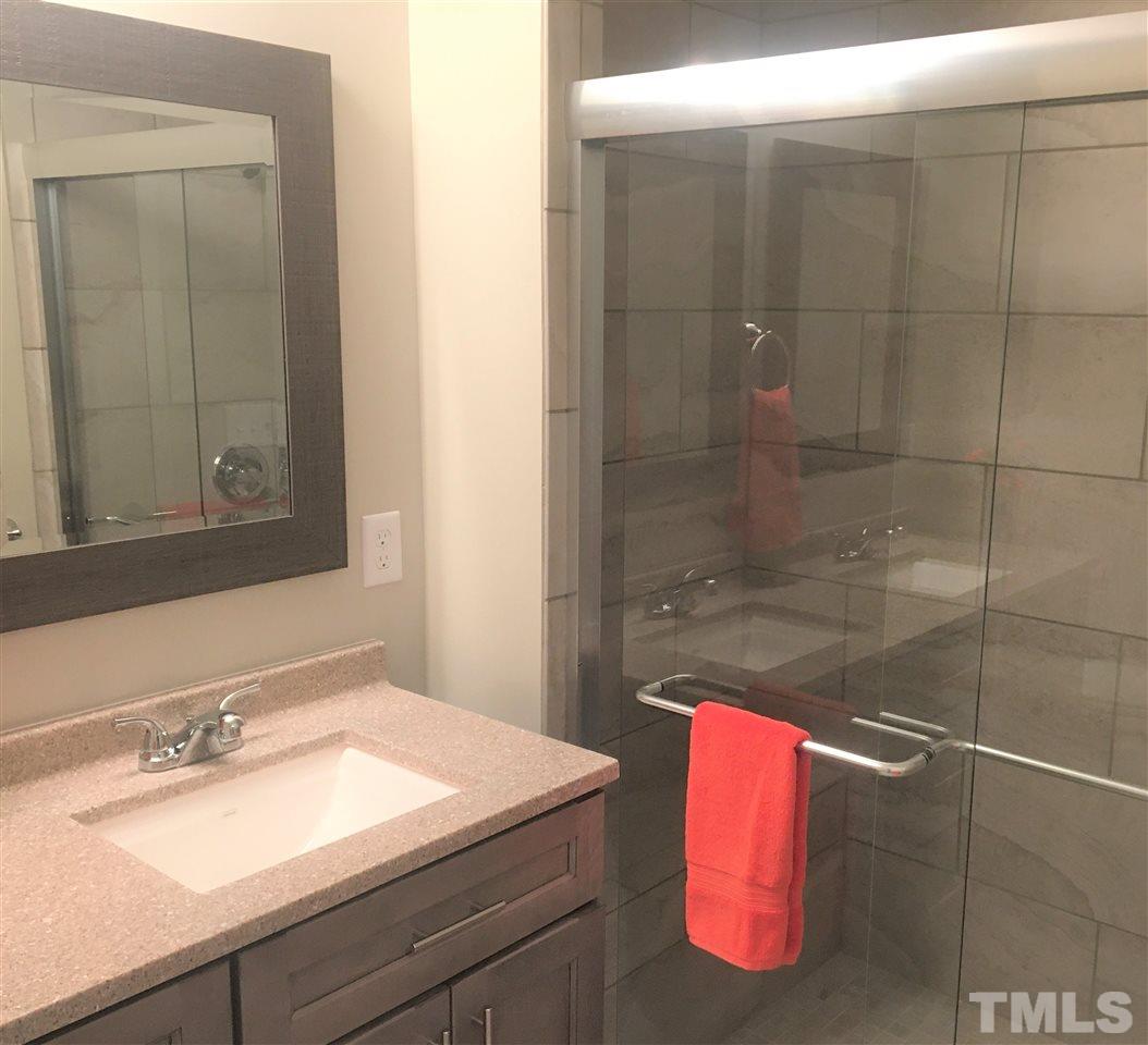 932 Bluestone Road Durham, NC 27713 - Photo 11 of 18 Upgraded tile shower
