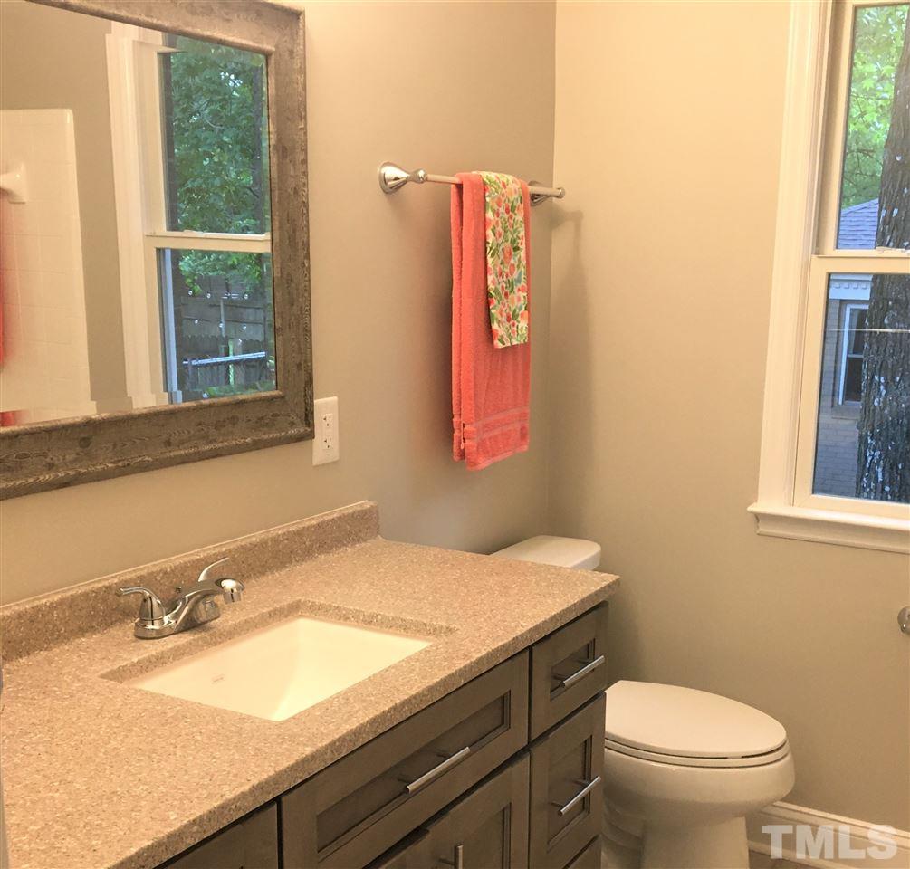932 Bluestone Road Durham, NC 27713 - Photo 14 of 18 Completely renovated full bath.