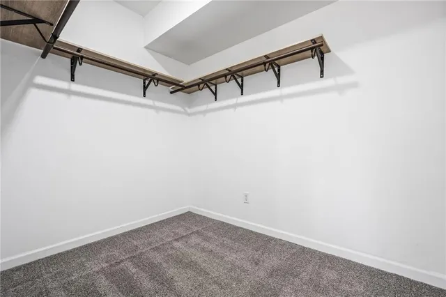 a view of a room with racks on the wall