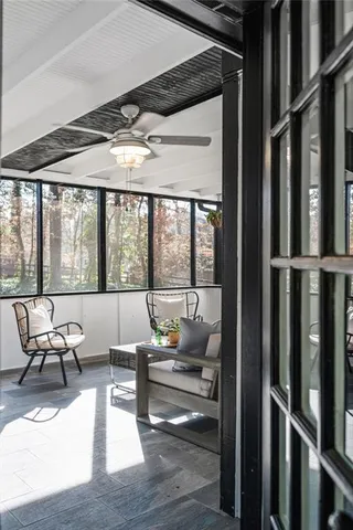 a living room with furniture and a window