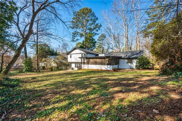 a front view of house with yard and seating area