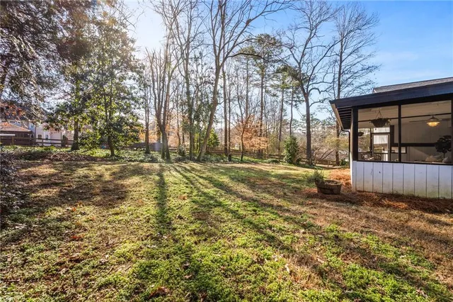 a view of yard with trees