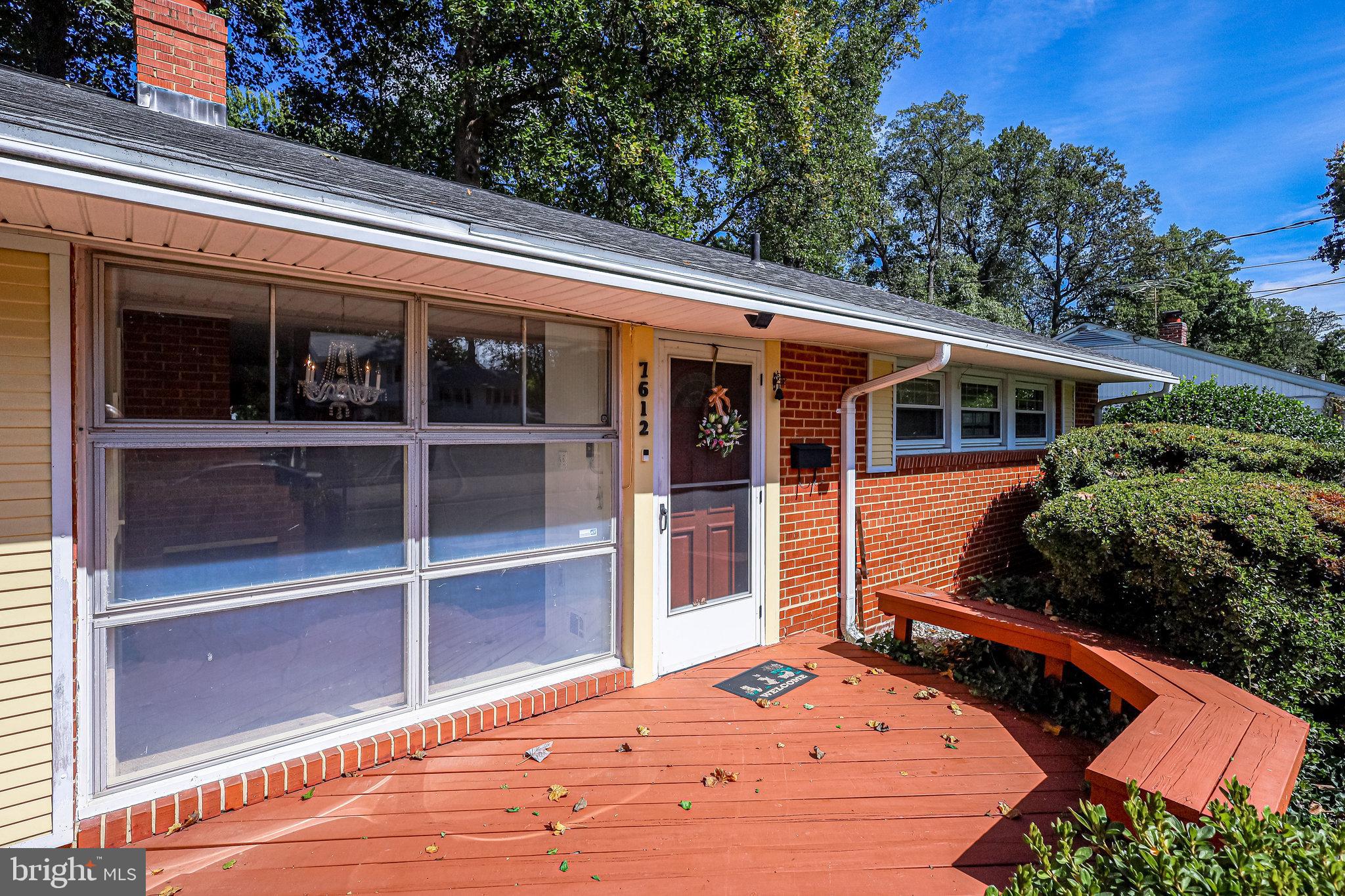 7612 Dunston Street Springfield, VA 22151 - Photo 40 of 51 Welcoming Front Deck with Seating