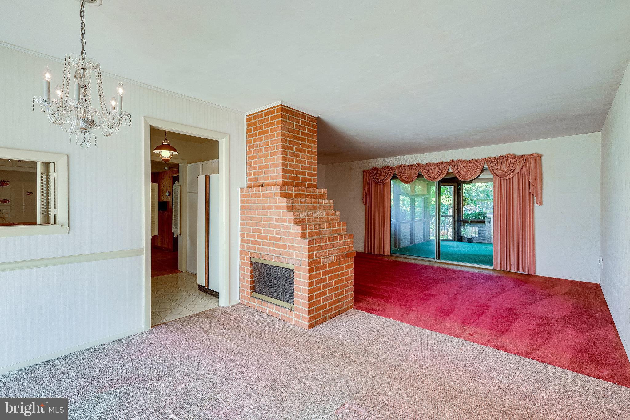 7612 Dunston Street Springfield, VA 22151 - Photo 6 of 51 Dining Room to Living Room and Screened Porch