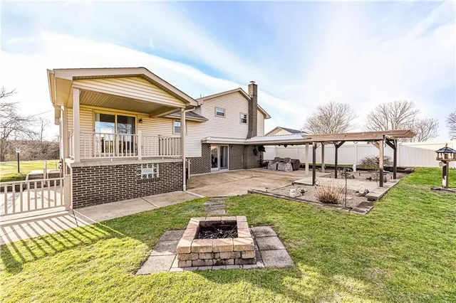 a view of a house with a big yard