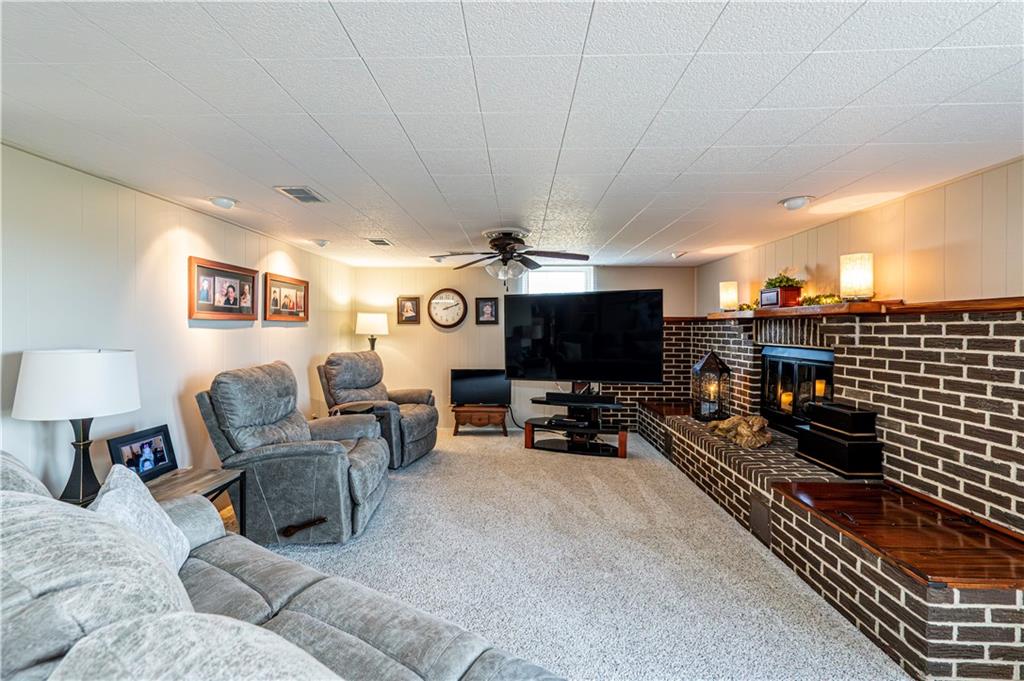 108 Stewart Road Derry, PA 15627 - Photo 7 of 30 a living room with furniture and a flat screen tv