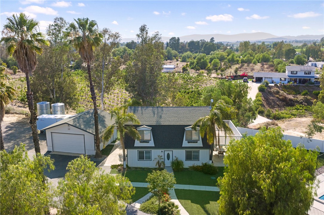 35825 Meadow Ridge Road Temecula, CA 92592 - Photo 22 of 75 a view of a house with a yard