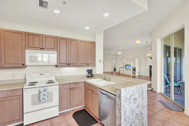 a bedroom with a bed and painting on the wall