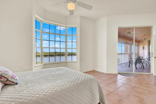 a bathroom with a sink mirror vanity and toilet