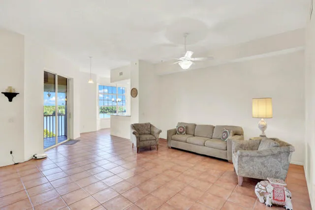 a kitchen with stainless steel appliances a refrigerator and a stove top oven