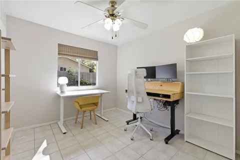 a view of a workspace with furniture