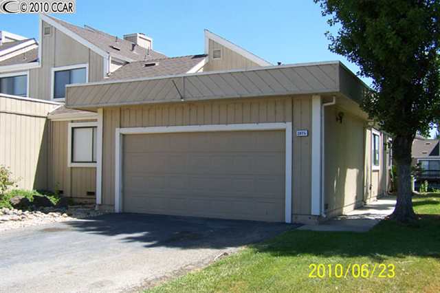 2075 Sand Point Road Discovery Bay, CA 94505 - Photo 1 of 1 a front view of a house with garden