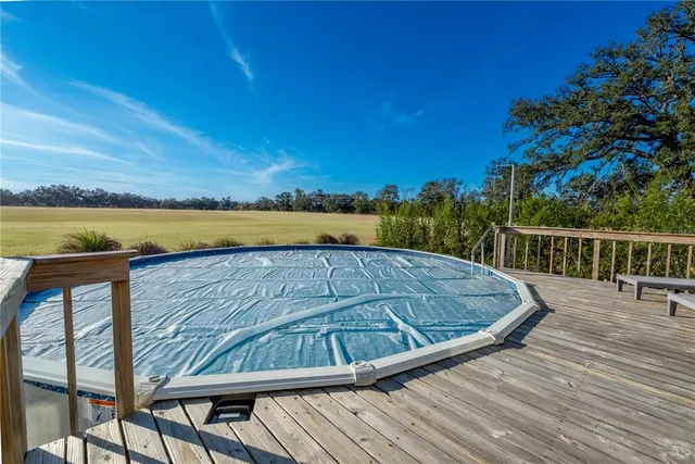 a kitchen with stainless steel appliances granite countertop a stove sink and cabinets