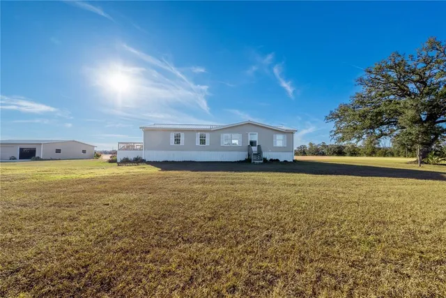 a house view with a garden space