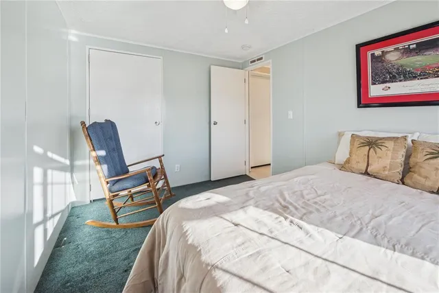 a room with furniture and a flat screen tv