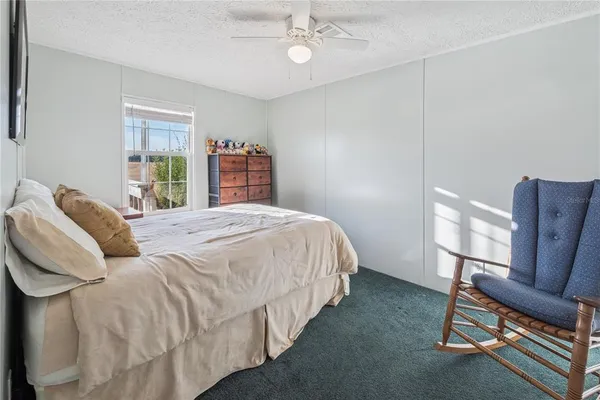 a room with furniture and a flat screen tv
