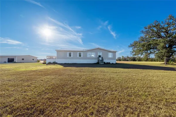 a view of a house with a outdoor space
