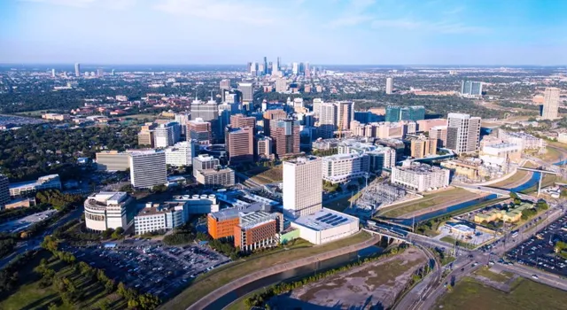 an aerial view of a city with lots of residential buildings