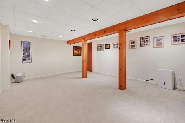 a view of a livingroom with an empty room