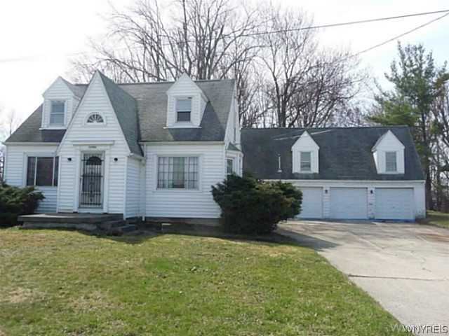 3871 Sheldon Road Orchard Park, NY 14127 - Photo 1 of 1 Exterior Front Updated expanded Cape with 3 car ga