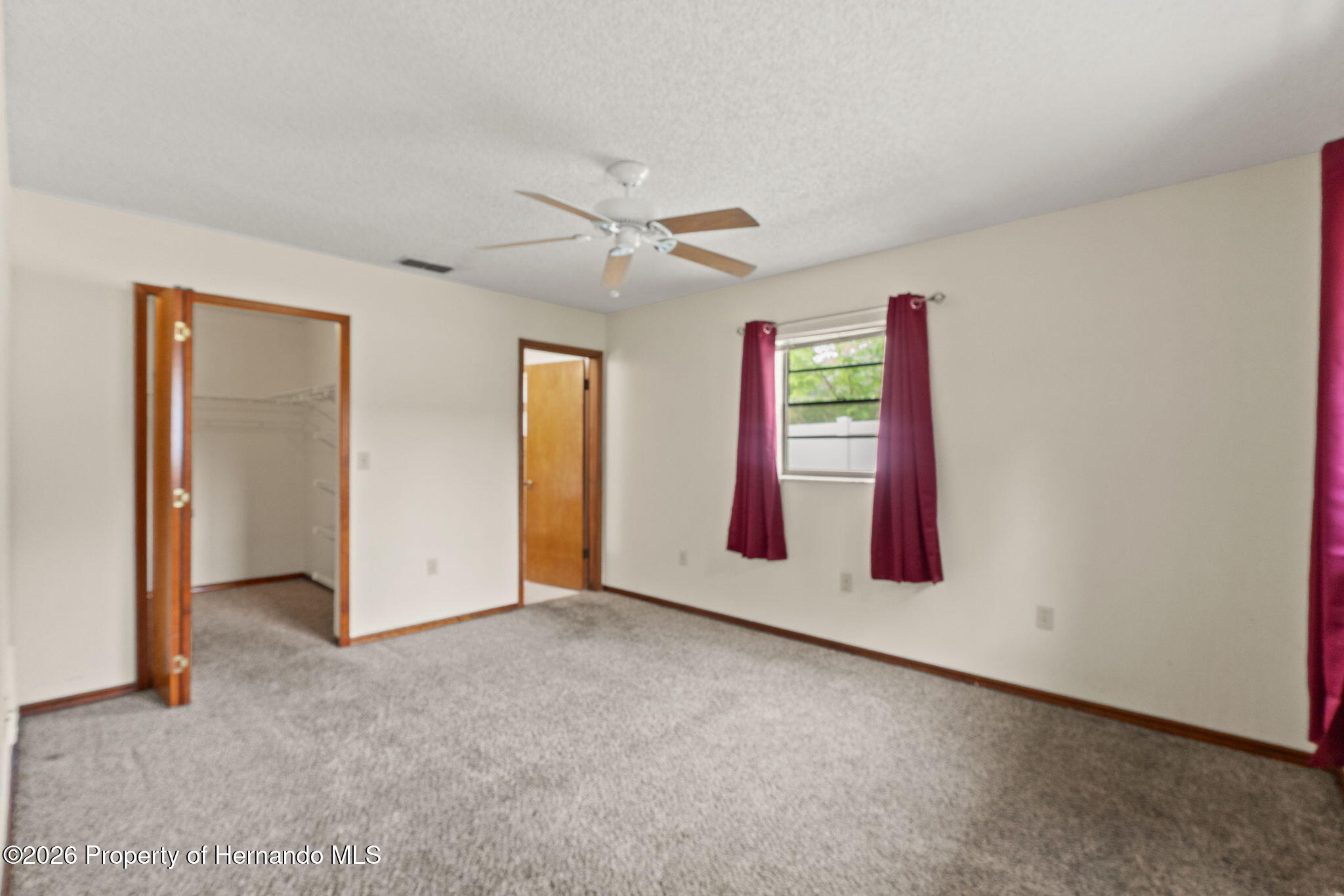11312 Sedgefield Avenue Spring Hill, FL 34608 - Photo 15 of 28 primary bedroom