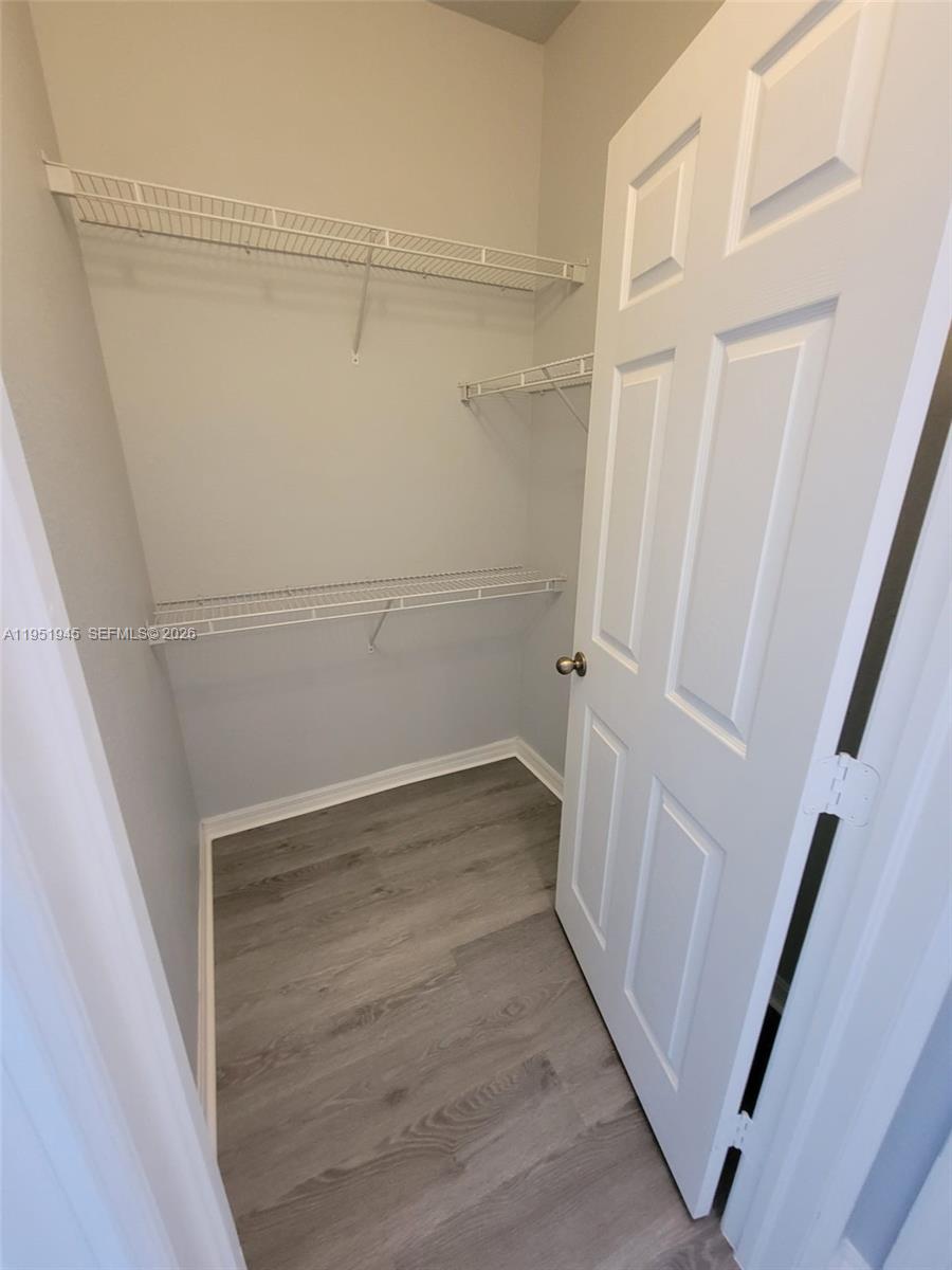 751 Southeast 2nd Street Homestead, FL 33030 - Photo 8 of 18 a view of walk in closet