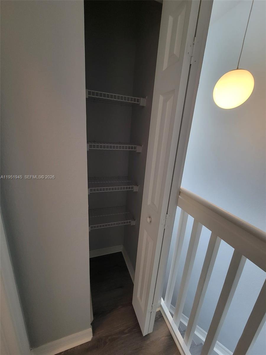 751 Southeast 2nd Street Homestead, FL 33030 - Photo 9 of 18 a view of a room with wooden floor
