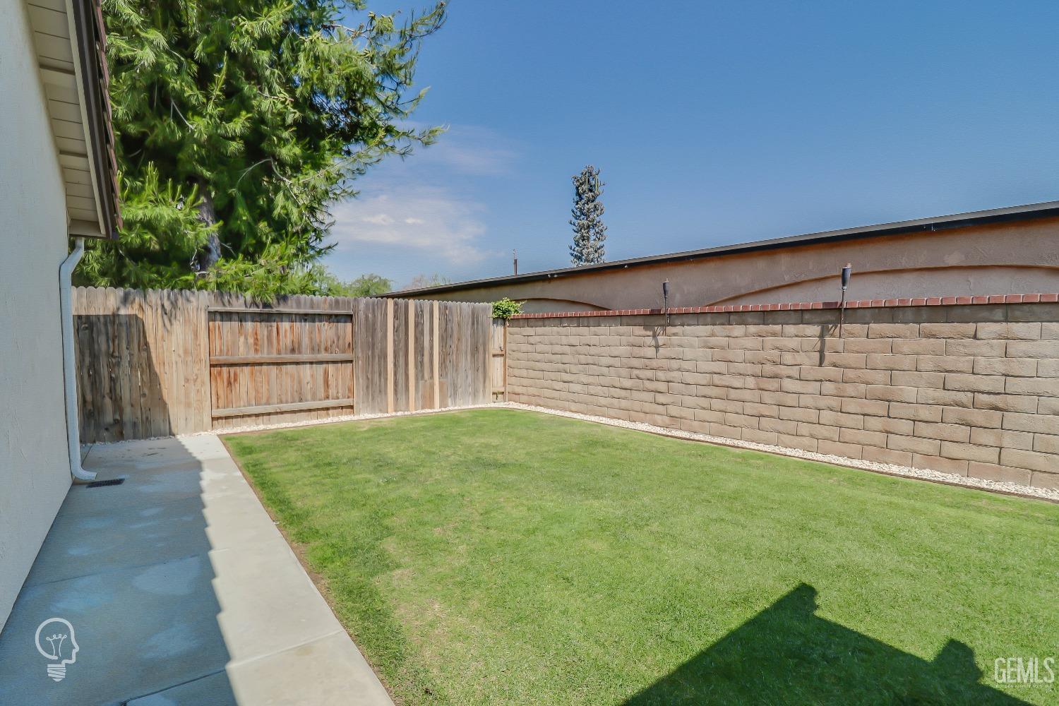 Undisclosed Address Bakersfield, CA 93311 - Photo 19 of 19 a view of a backyard