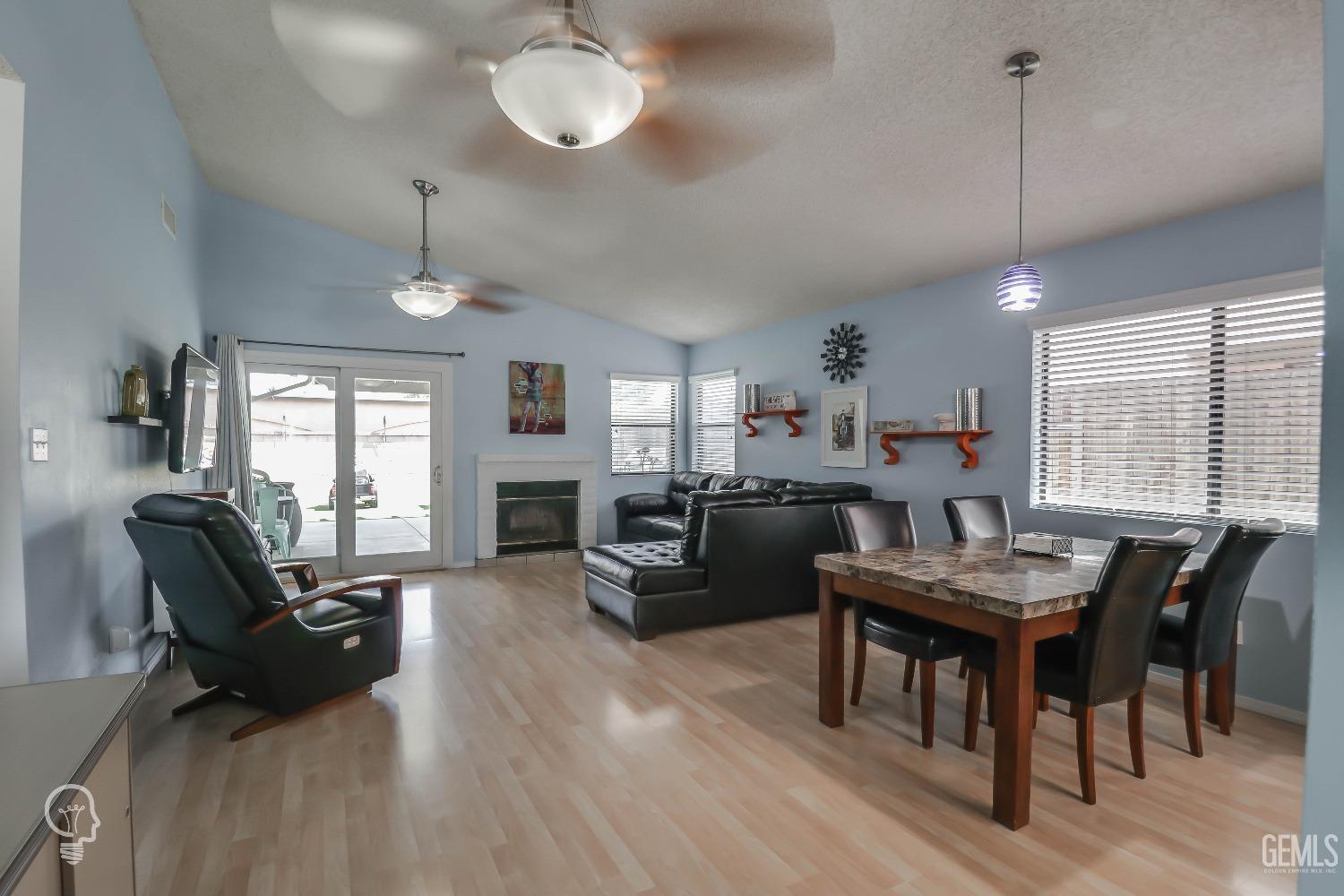 Undisclosed Address Bakersfield, CA 93311 - Photo 6 of 19 a view of a dining room with furniture window and wooden floor