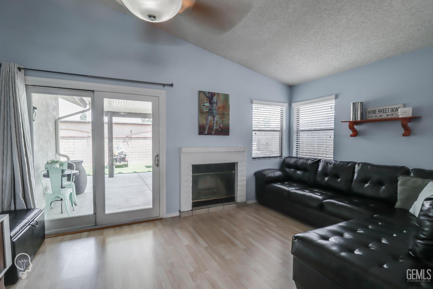 Undisclosed Address Bakersfield, CA 93311 - Photo 7 of 19 a living room with furniture window and wooden floor