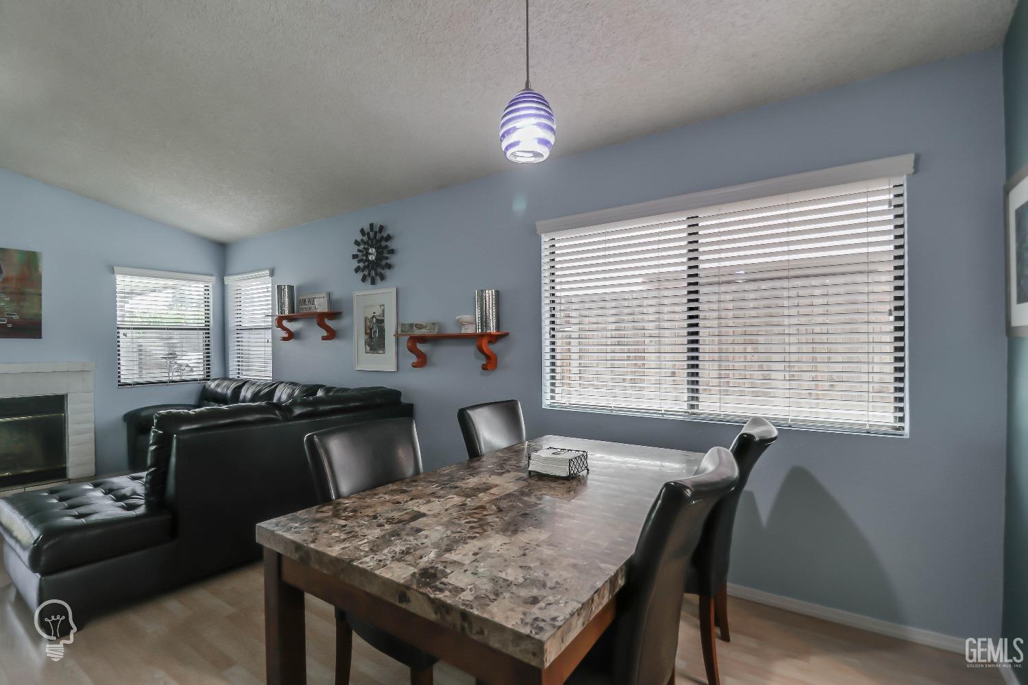Undisclosed Address Bakersfield, CA 93311 - Photo 8 of 19 a view of a dining room with furniture