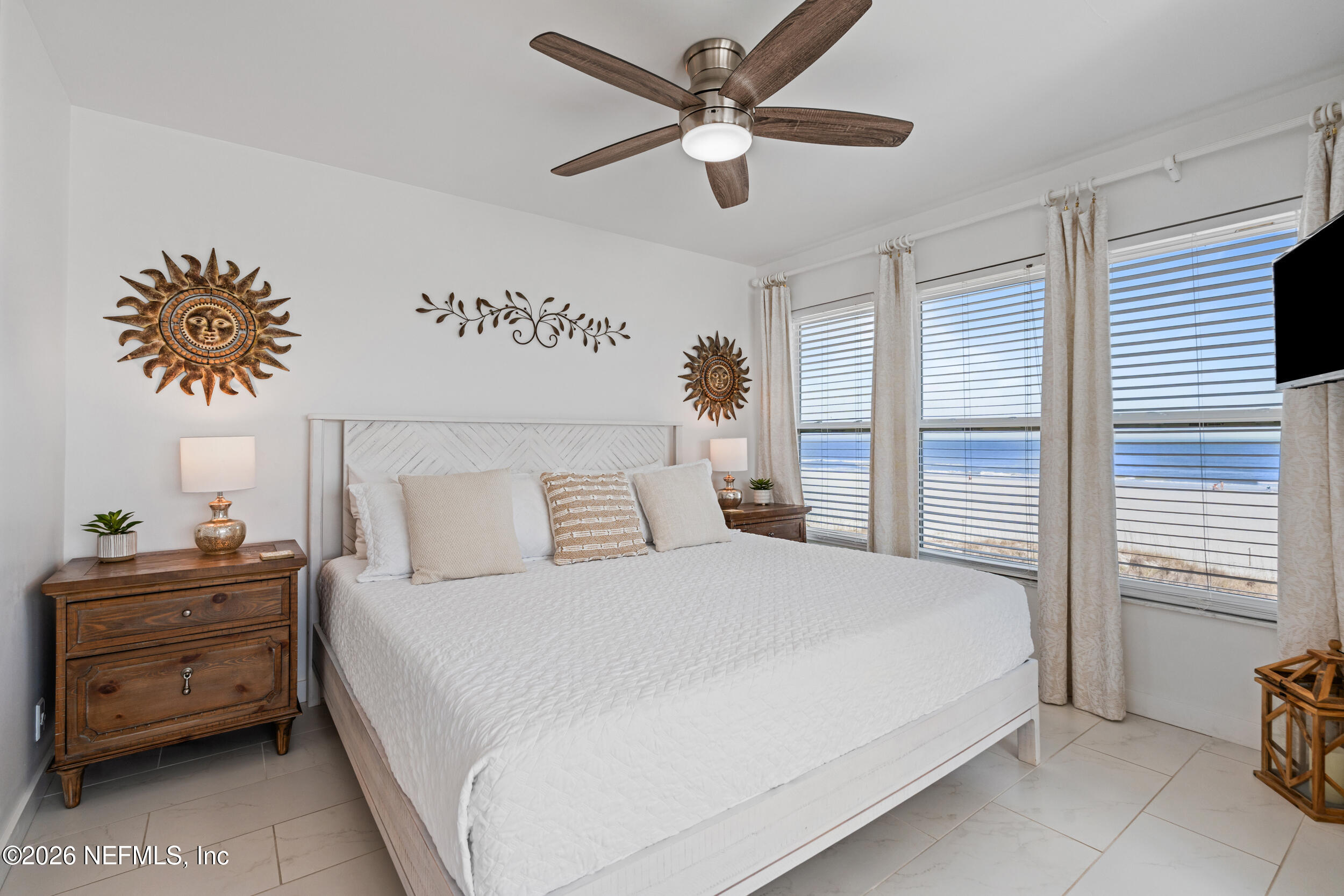 2 10th Street, Unit 6 St. Augustine Beach, FL 32080 - Photo 14 of 40 a bedroom with a bed and a ceiling fan