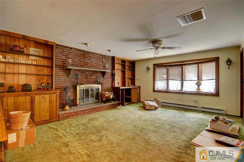 139 East Cliff Road Colonia, NJ 07067 - Photo 16 of 24 a view of a room with gym equipment