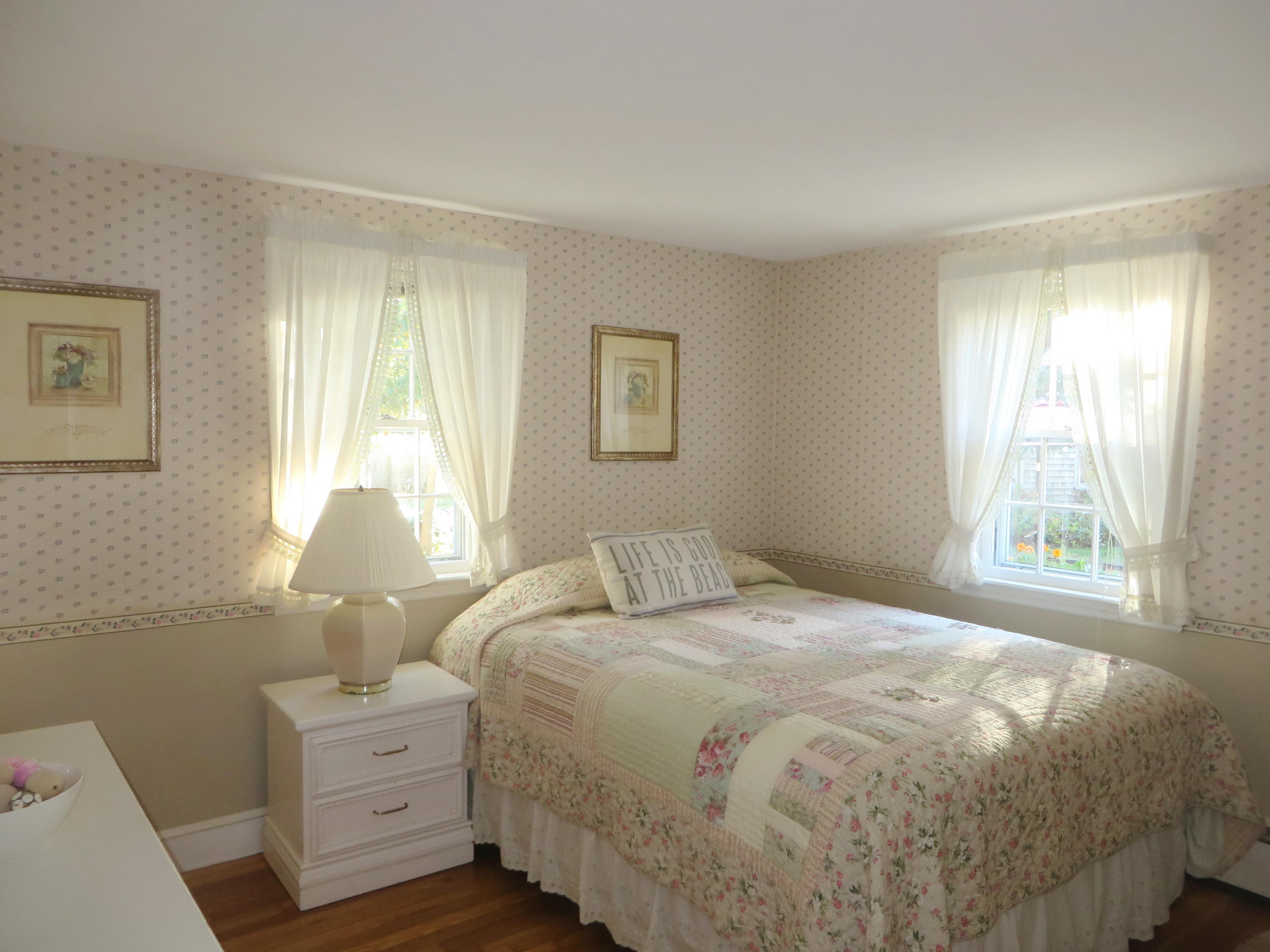 229 Lower County Road West Harwich, MA 02671 - Photo 11 of 23 a bedroom with a bed and a window