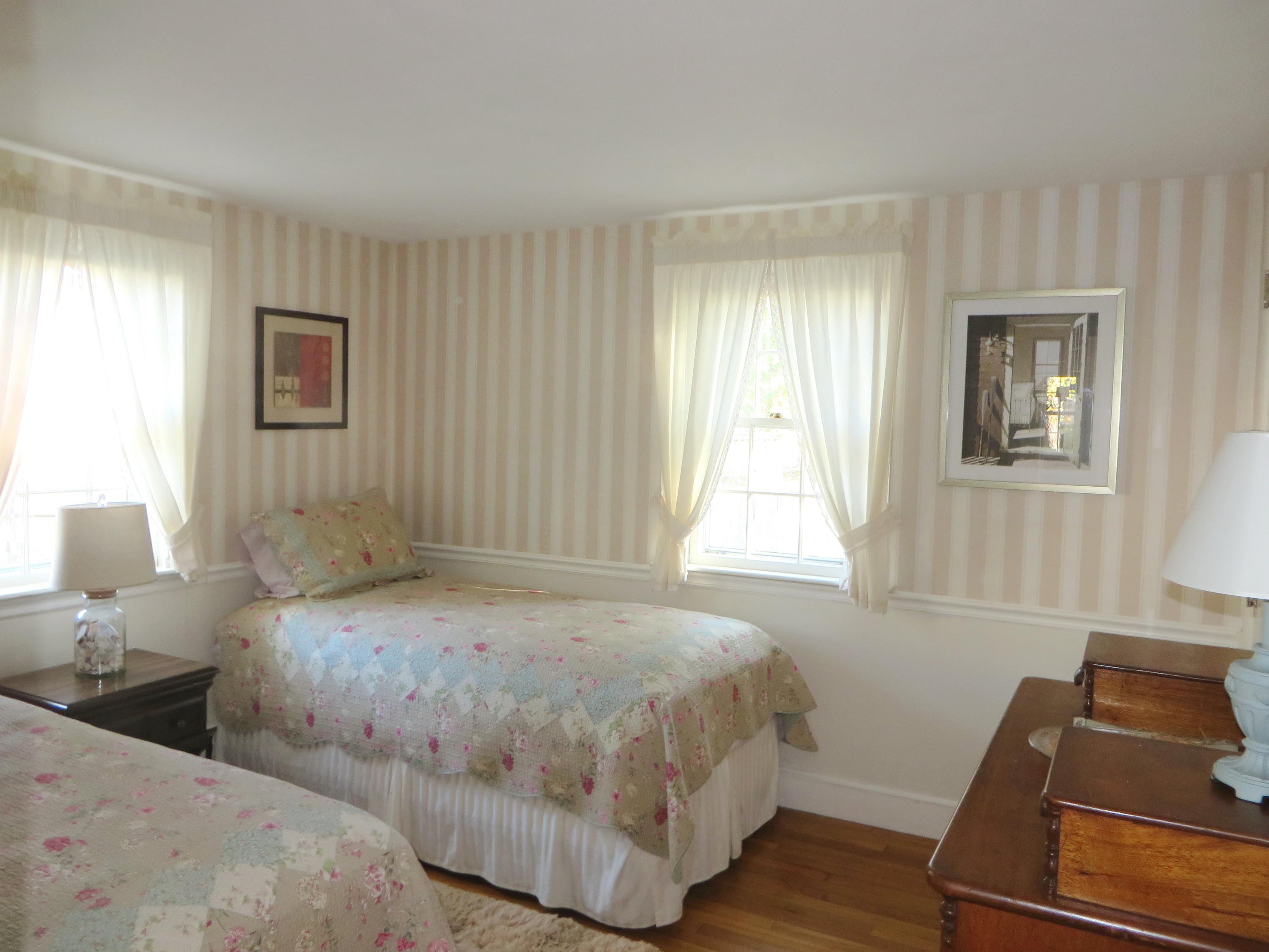 229 Lower County Road West Harwich, MA 02671 - Photo 12 of 23 a bedroom with two beds and a window