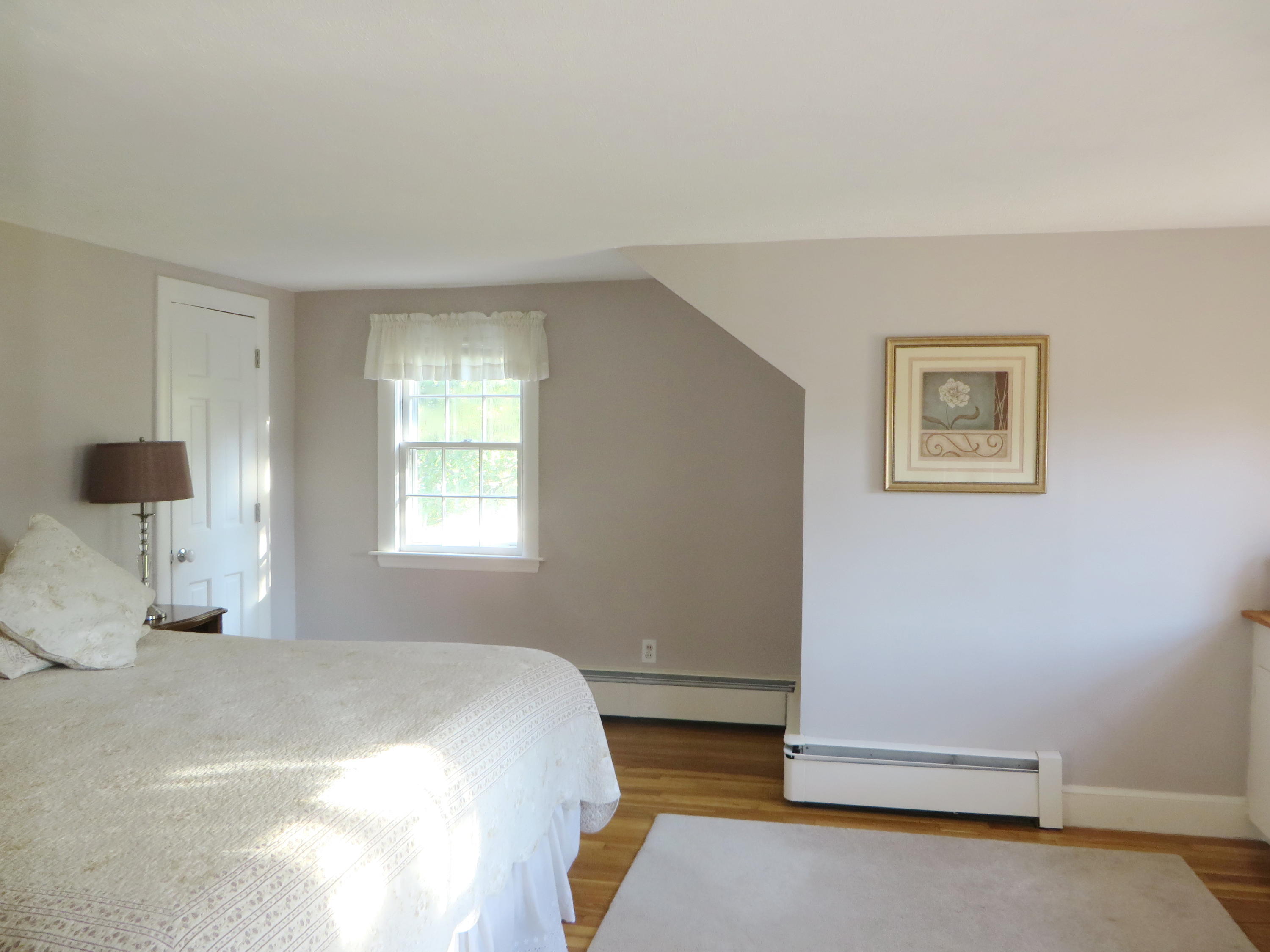 229 Lower County Road West Harwich, MA 02671 - Photo 14 of 23 a bedroom with a bed and a window