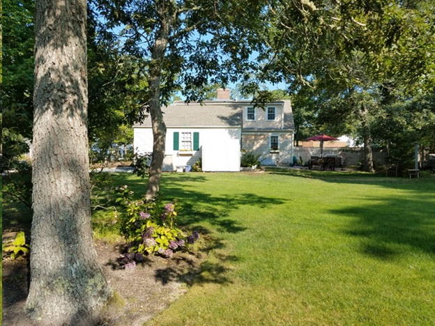229 Lower County Road West Harwich, MA 02671 - Photo 23 of 23 a house view with a garden