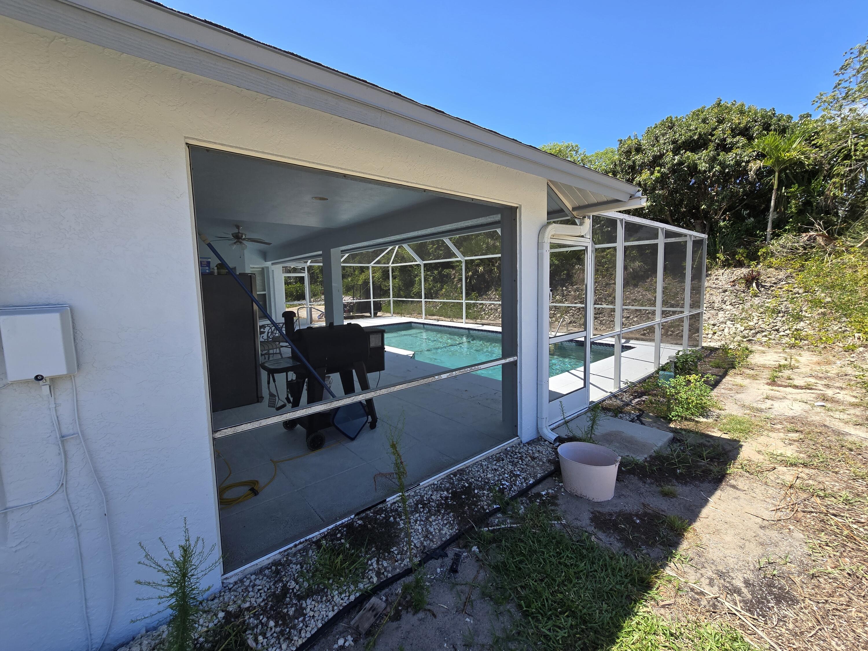 2049 San Marco Road Marco Island, FL 34145 - Photo 10 of 71 West Side of House and Pool!