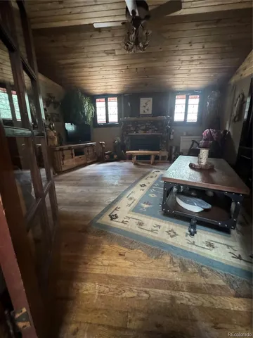 a view of a livingroom with furniture window and outside view